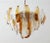 Original Italian chandelier with layers of amber and clear shell shaped Murano glasses mounted on brass frame by La...