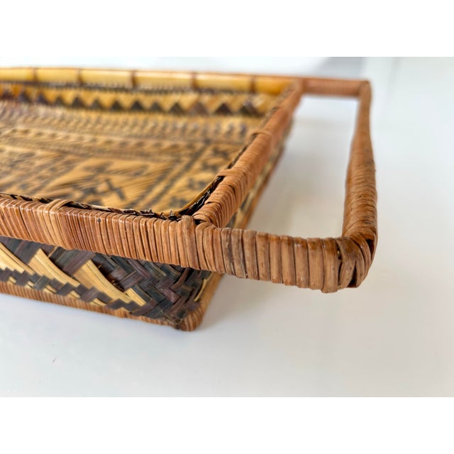 Hand woven rectangular rattan tea tray with handles. "Tea Please" written in Chinese on interior of tray.