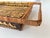 Hand woven rectangular rattan tea tray with handles. "Tea Please" written in Chinese on interior of tray.