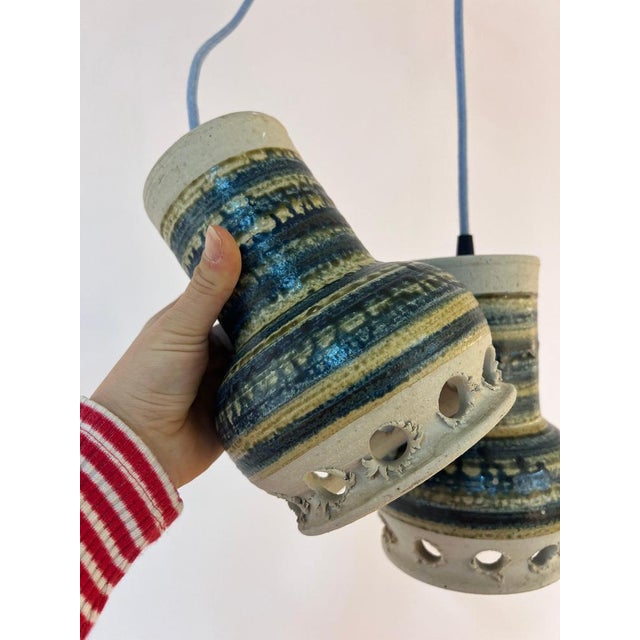 This pendant lamp by Danish ceramicist Per Engstrøm is a distinctive example of Scandinavian craftsmanship from the 1960s....