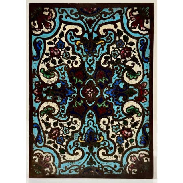 Decorative vintage cloisonné enamel box featuring a vibrant turquoise ground with intricate scrolling floral motifs in...