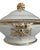 An elegant and unusually sculptural 19th-century porcelain covered serving dish, likely French or Continental European and...