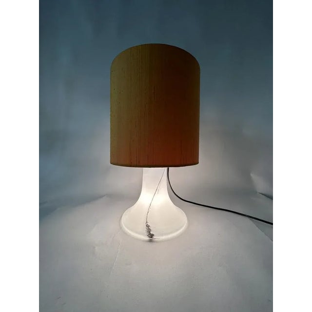 Dimensions: 53cm H, 33cm Diameter Material: Glass, fabric Manufacturer: Peil & Putzler Color: White , orange , black Up to...