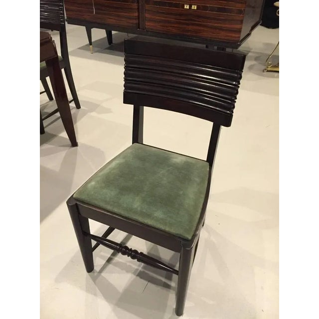 A stunning set of six French Art Deco Dining chairs in the manner of Gaston Poisson. Very stylish legs and beautiful wood...