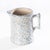 Spongeware pitcher with soft colors. Great decorative piece for the kitchen or for use with a good cleaning.