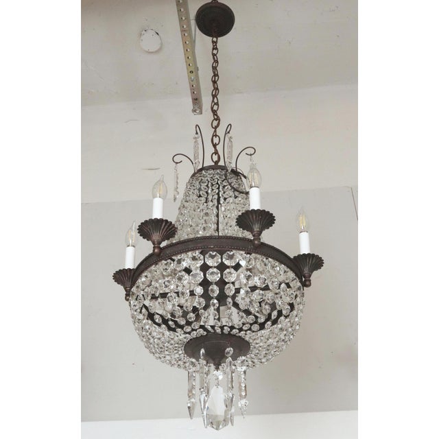 A rare piece of New York City’s Gilded Age history, this stunning Empire-style chandelier was repurposed from a monumental...