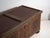 This antique painted dowry chest in pine is a polychrome folk trunk with a flat lid and a decorated front, on bun feet. It...