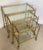 Just in, This set of three French Neoclassical style nesting bar carts, Maison Bagues, from the 20th century. This set has...