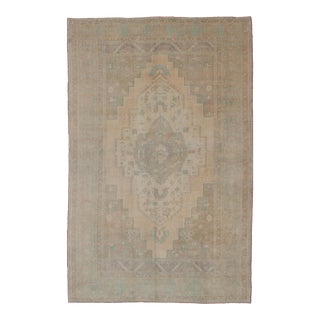 Faded Turkish Hand Knotted Oushak With Medallion With Muted Colors of Tan, Muted Light Peach For Sale