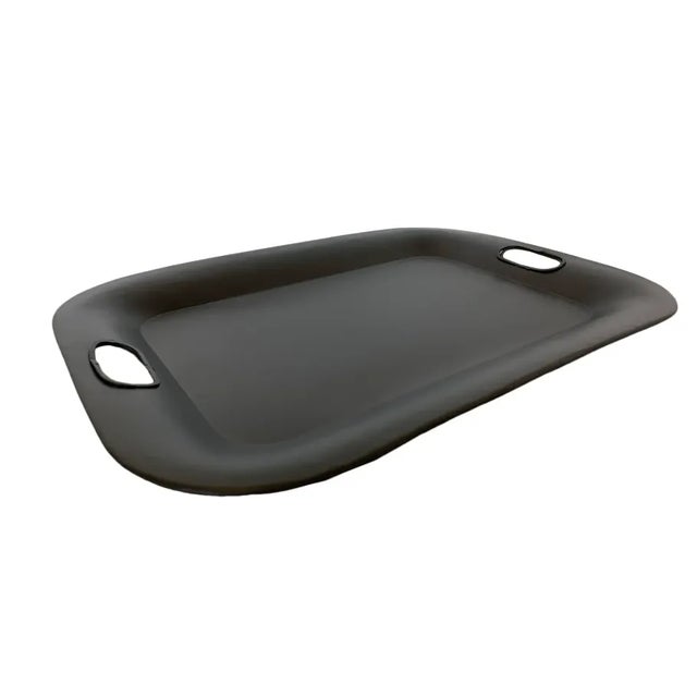 Simple lines, this solid matte black metal tray is a great addition to many different styled decor. Use as a functional or...