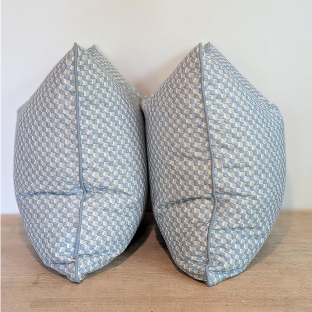 Fermoie Ruffle pillows in light blue, colorway 012, double sided with coordinating blue linen cord. Ruffle is 100%...