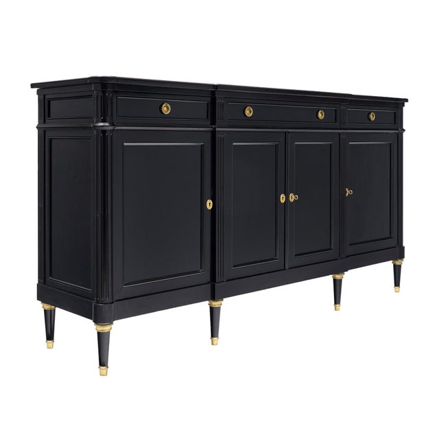 Buffet from France in the Louis XVI style. This enfilade is made of solid wood construction, primarily mahogany. It has...