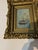 Antique Venetian canal scene oil painting. The artwork is housed in an ornate, gilt-carved frame typical of late 19th-...