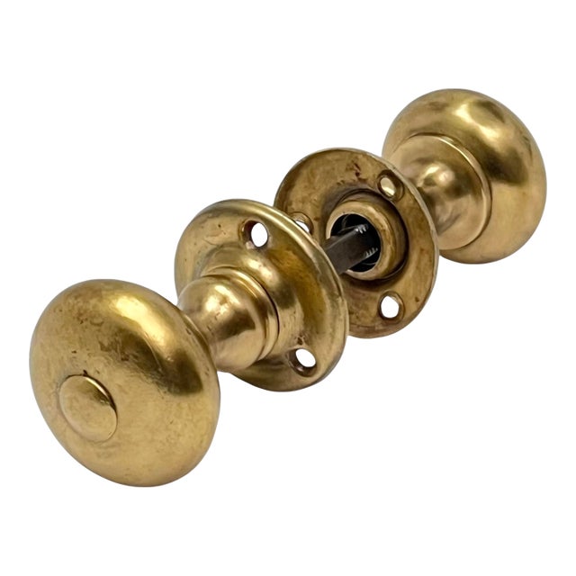 1930s American Cast Brass Art Deco Door Knobs W/ Rosettes. A Pair For Sale
