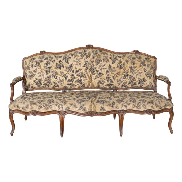 18th Century Louis XV Period Walnut Sofa with Floral Carvings and Tapestry Uphol For Sale