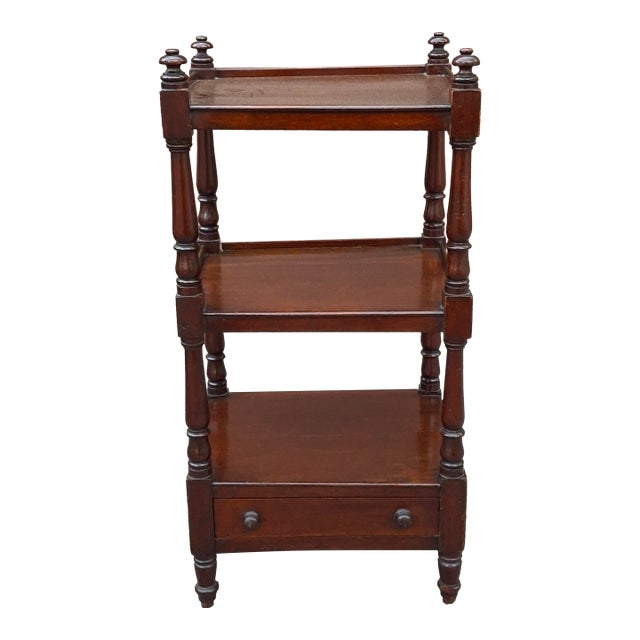 A Mid Victorian Opulence Mahogany Three-tier Whatnot with a Drawer, Circa 1850s A Mid Victorian Opulence Mahogany Three-...