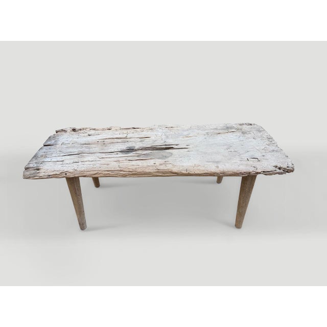 A single panel of reclaimed teak wood with a slight live edge has been bleached whilst respecting the natural organic...