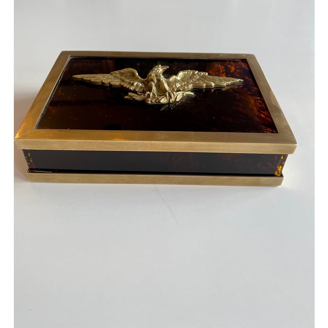 Vintage Empire Faux Tortoise Box with Brass Eagle, 1970s, in Very Good conditions. Designed 1970 to 1979 This piece is...