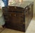 Antique decorated metal travel trunk with brass fittings – late 19th century rare metal travel trunk with a faux wood...