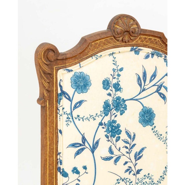 Louis XVI Style Floral Upholstered Walnut Folding Table Screen, the three panels with blue and white floral design and...