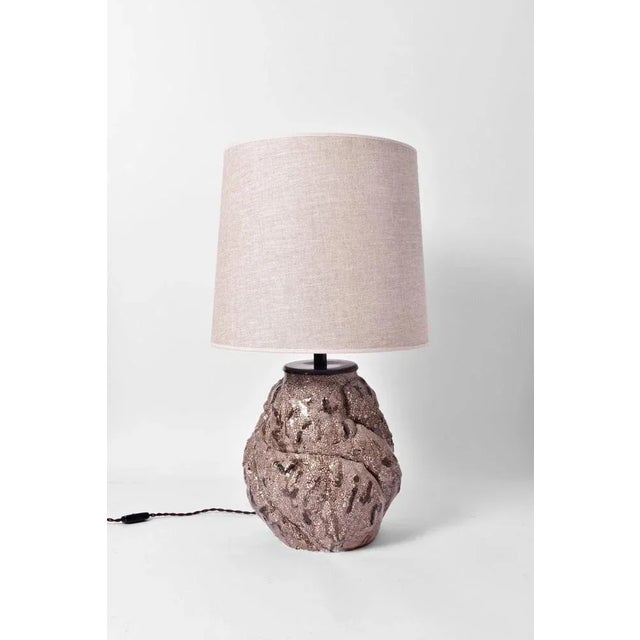 Brown and beige ceramic lamp, Helder. Height (cm): 33 Diameter (cm): 30 Up to 250V (Europe/UK Standard).The wiring of this...