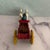Early 20th-century figurine of Amish farmer and his horse team pulling a wagon of logs. Made of cast iron and hand-...