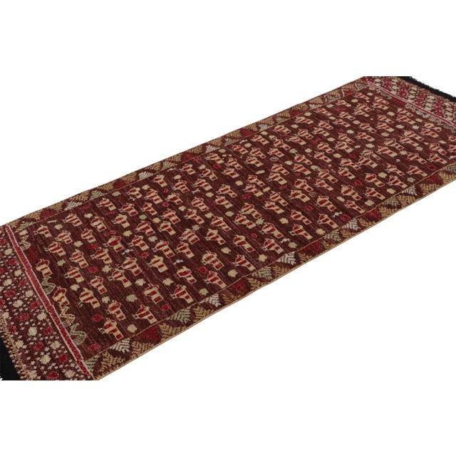 Hailing from Rug & Kilim’s Burano collection, this is a 3x8 runner inspired by tribal rugs with rare pictorial patterns....