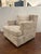 Stylish Revelation Unwind Swivel Chairs / Wheat - Pair. Cream/Beige/White textured fabric. Boxy shape. Original Retail...
