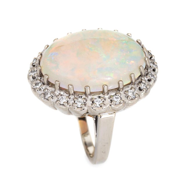 Stylish vintage opal & diamond cocktail ring (circa 1970s to 1980s) crafted in 14 karat white gold. Natural opal measures...