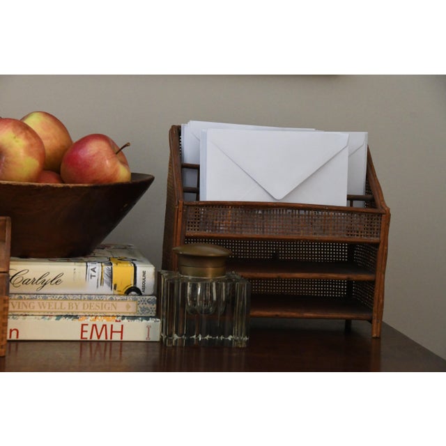 A hand-carved antique wooden bowl with tonal variation and soft edge wear from years of use. Fill it with fruit on a...