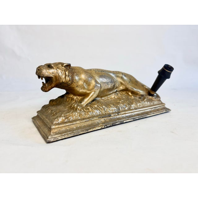 Add some bite to your signature! Fierce and functional, this vintage gilt pen holder will bring an opulence to any desk....