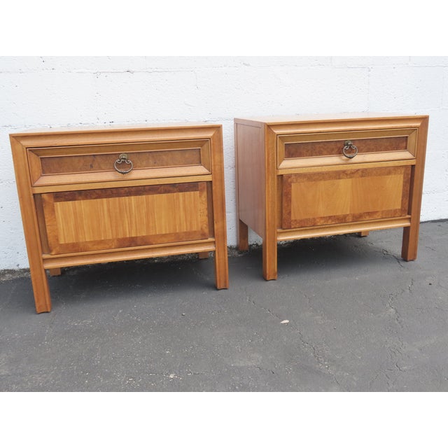 This magnificent Pair of Nightstands is made of wood, mahogany, burlwood, veneer, oak, and metal. The Nightstands were...