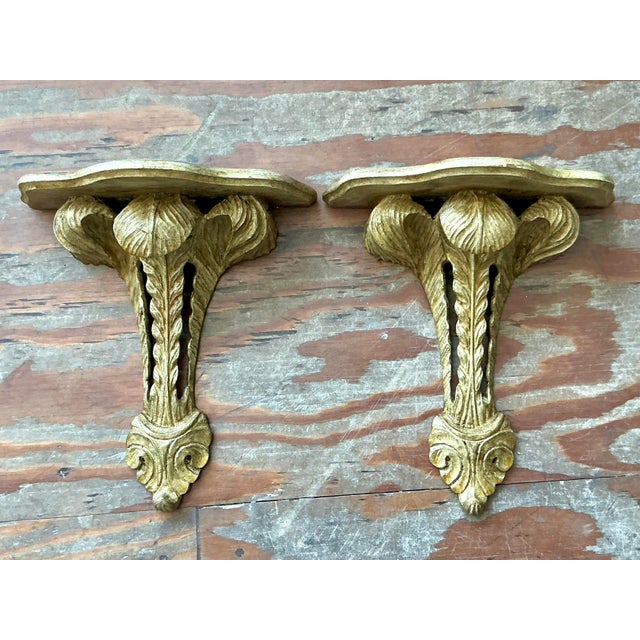 infuse your interiors with the opulent charm of Old World Europe with this striking pair of vintage Italian giltwood wall...
