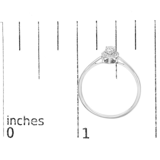 Metal 10K White Gold 5X3MM Oval White Topaz and Diamond Accent Halo Ring (I-J Color, I1-I2 Clarity) - Ring Size 7 For Sale - Image 7 of 7