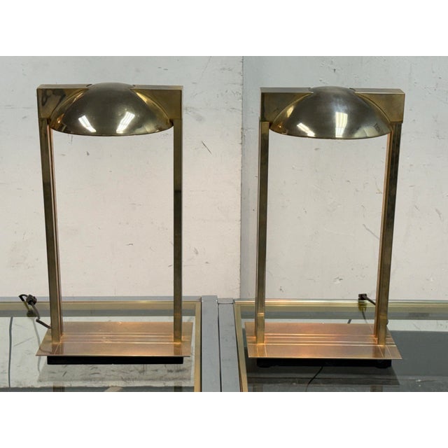 Design Plus Gallery presents a Pair of Chrome + Brass Table Lamps by Relux Milano from the 1970's. This iconic mid-century...