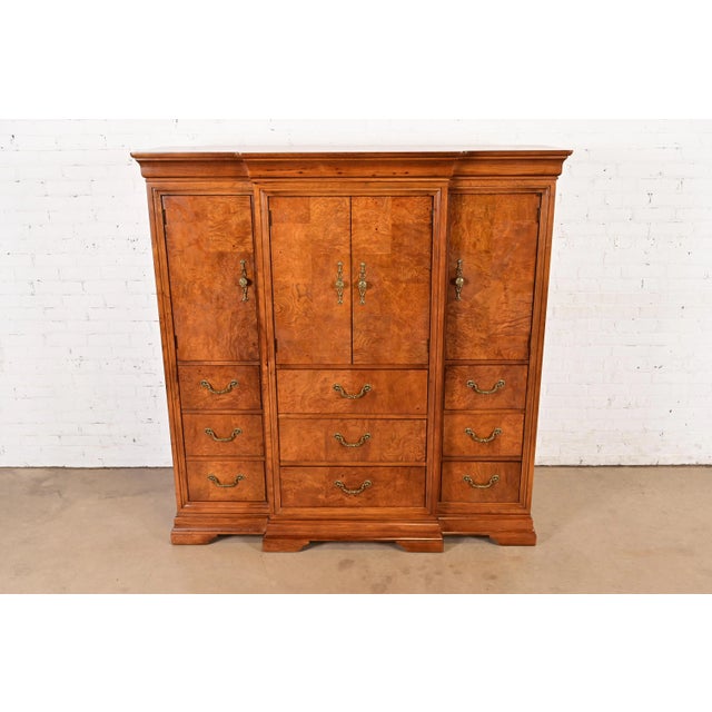 A gorgeous Louis Philippe or French Regency Louis XVI style gentleman's chest, armoire dresser, or linen press By...