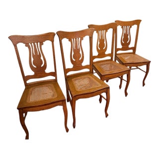 Antique c.1900 Quarter-Sawn Art Nouveau Tiger Oak Lyre Back Cane Dining Chairs. Set of Four For Sale