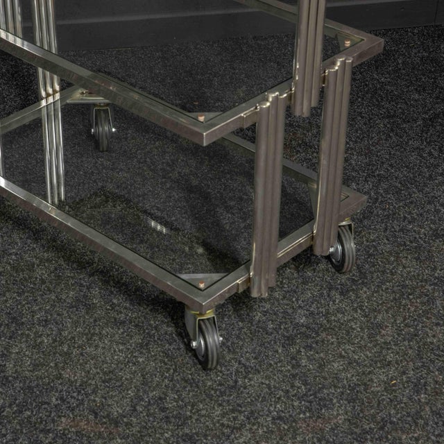 This is an absolutely stunning Art Deco tea trolley, very much in the skyscraper design. Very heavy duty chromed steel...