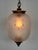 Vintage pendant lamp, dating approximately to the 1960s. Lantern (or bowl) lampshade in frosted glass. Geometric...
