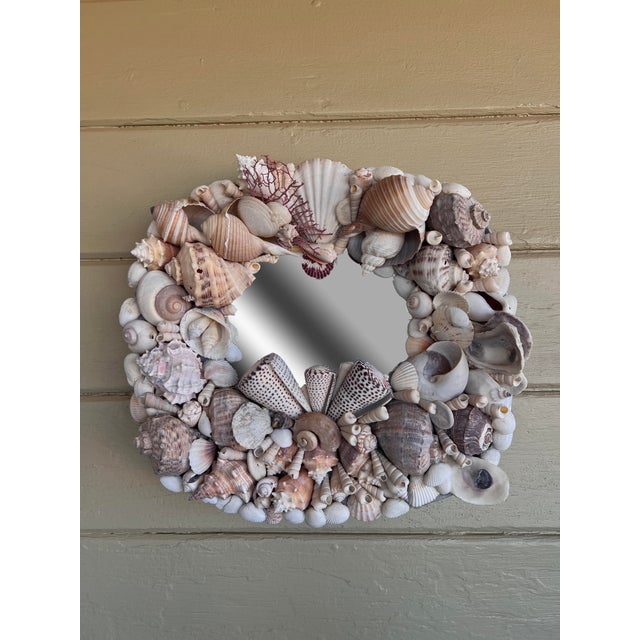 A beautiful highly decorative Italian baroque Grotto style wall mirror. The mirror is later decorated, has a pewter base,...