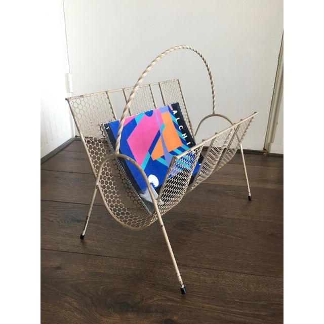 Vintage, Mid-Century Magazine Rack in the manner of Mategot. This piece is designed in the style of the selected designer...