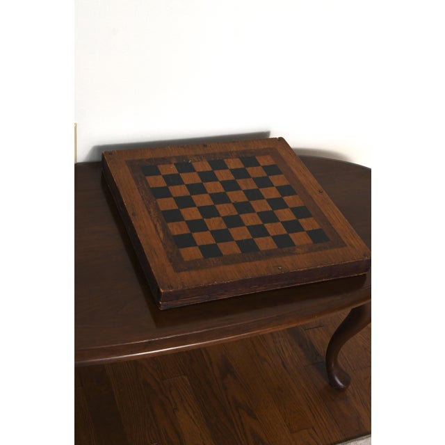 Well-worn antique condition consistent with age and use. The exterior shows surface wear, patina, scattered small nail...