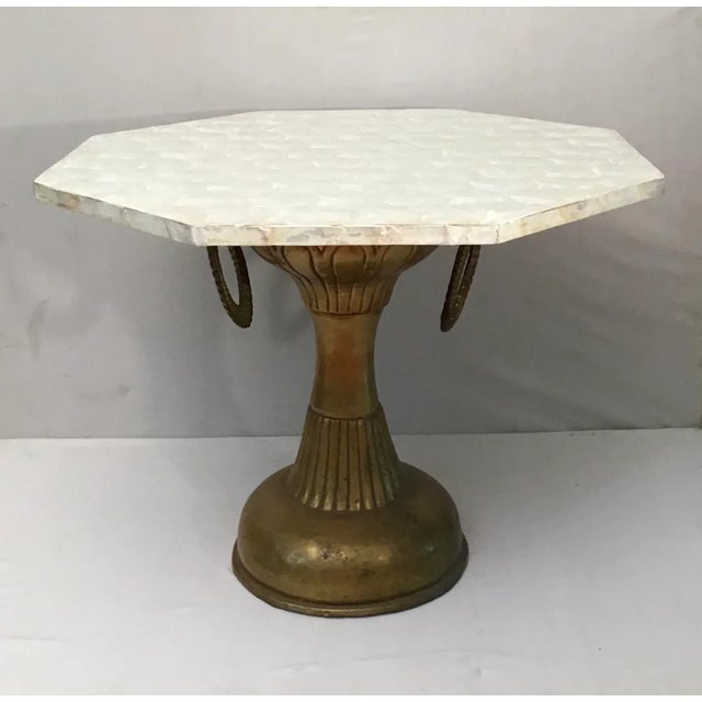 Late 1960’s early 70’s, octagon white shell, Capiz shell top with brass base occasional end table. Fully restored, no...