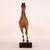 Horse, one of nine sculptures depicting animals of different species, entirely covered with fur; Each animal rests on a...