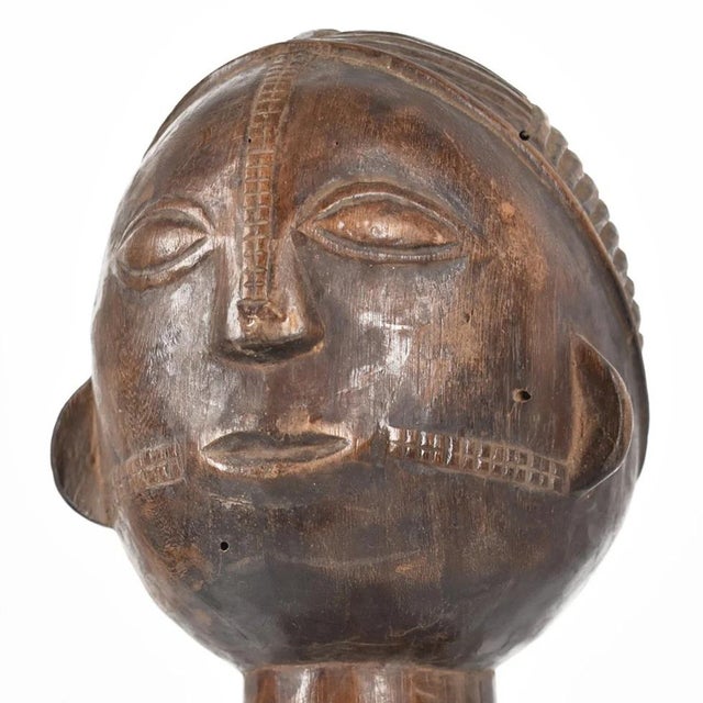 The Tabwa male figure stands as a remarkable embodiment of tradition and cultural identity within the Tabwa community of...