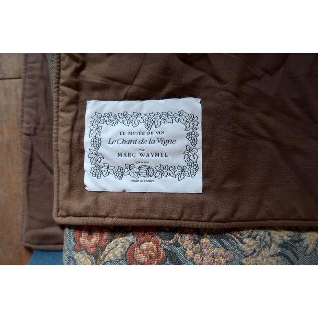 A Celebration of French Viticulture Presenting a charming vintage French tapestry wall hanging that captures the timeless...