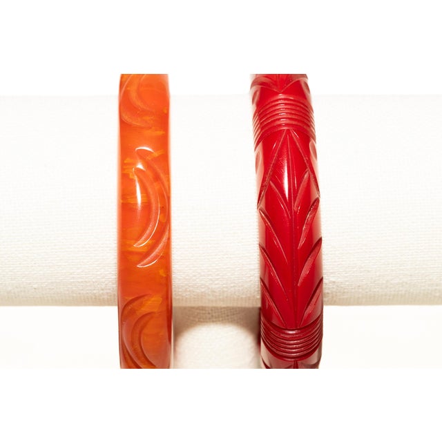 Vintage Carved Bakelite Bangle Bracelets in Red and Orange, 1930's, Pair Of For Sale - Image 12 of 17