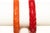 Vintage Carved Bakelite Bangle Bracelets in Red and Orange, 1930's, Pair Of For Sale - Image 12 of 17