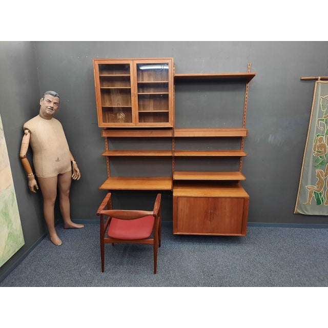 Modular 12-piece teak wall shelving system by Kai Kristiansen, 1960s. Striking design and highly practical. Very rare,...