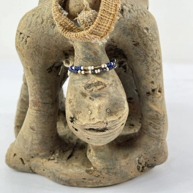 The Tabwa Figural Stool, originating from the Democratic Republic of Congo, stands as a striking example of the Tabwa...
